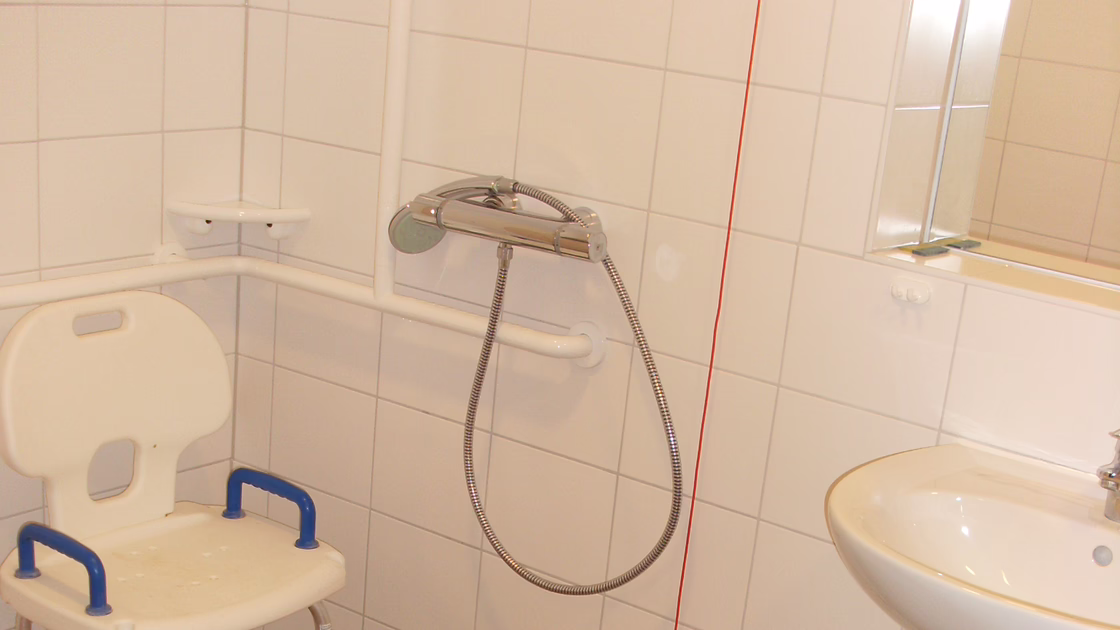 Barrier-free bathrooms were equipped with new, light-coloured tiles