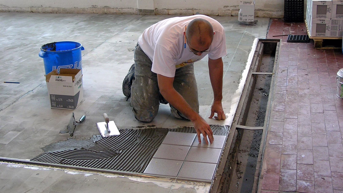 The laying of the new, white tiles
