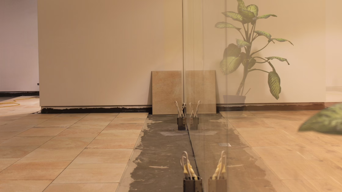 The new, beige tiles are laid.